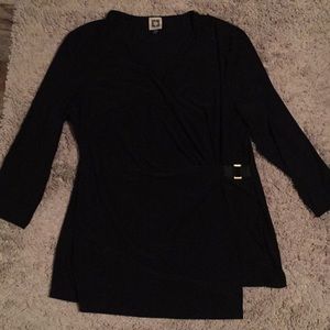 This is a very nice blouse. Worn once. Silky